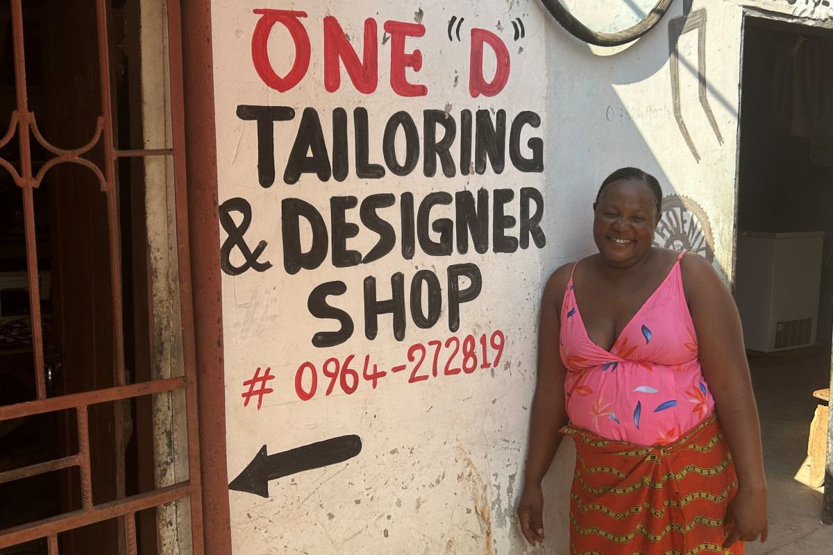 Deborah outside her shop