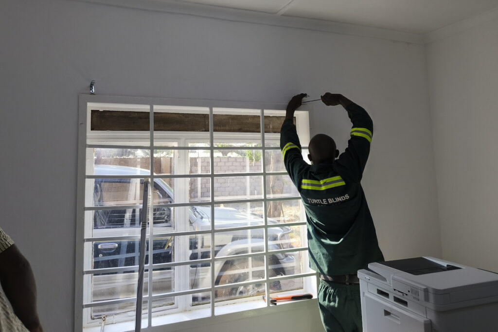 Installing blinds into the new office