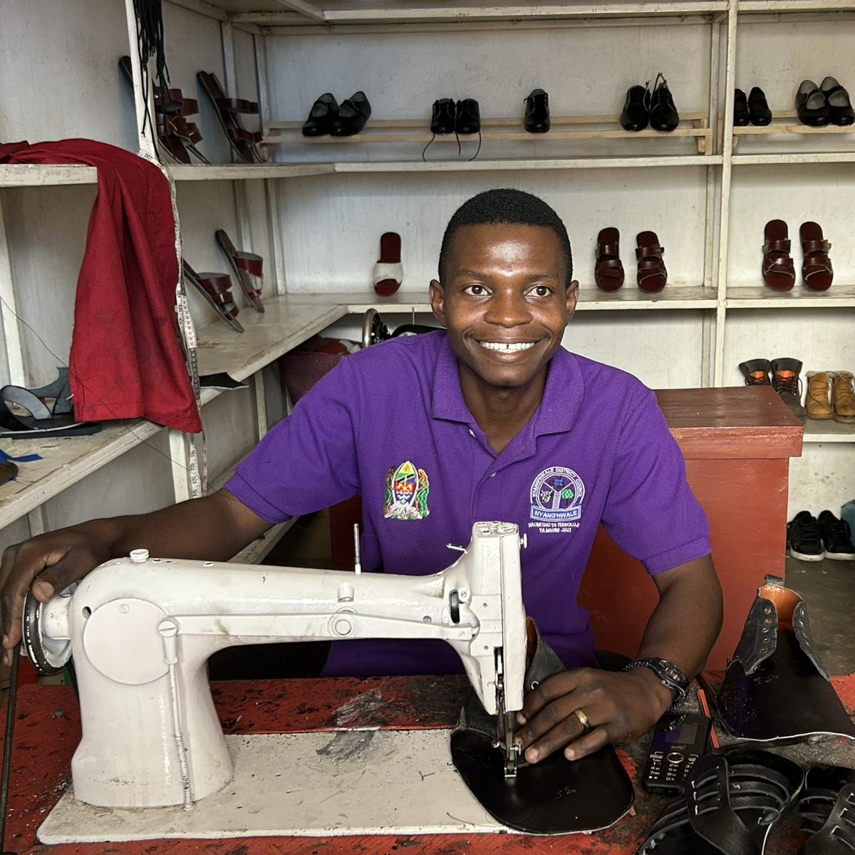 Sam making shoes