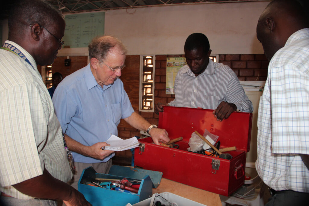 Roger unpacking tools in Zambia
